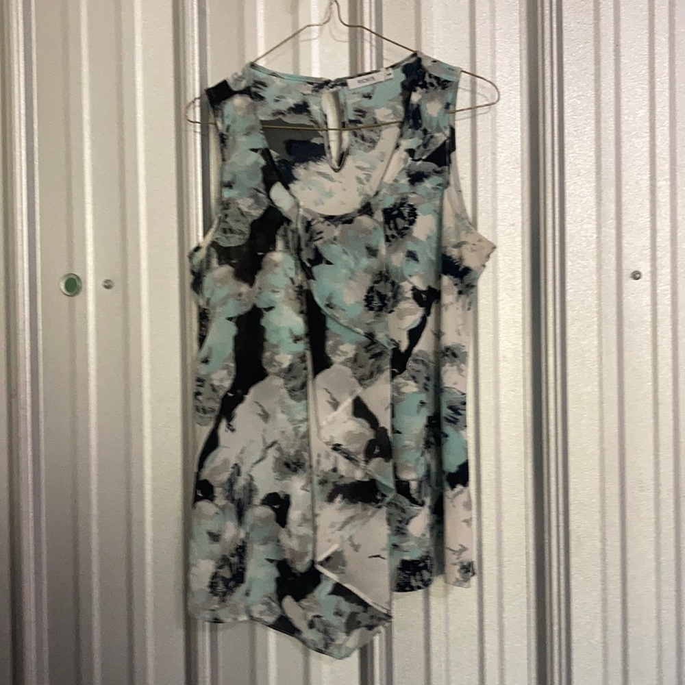 Ruffle front sleeveless blouse
